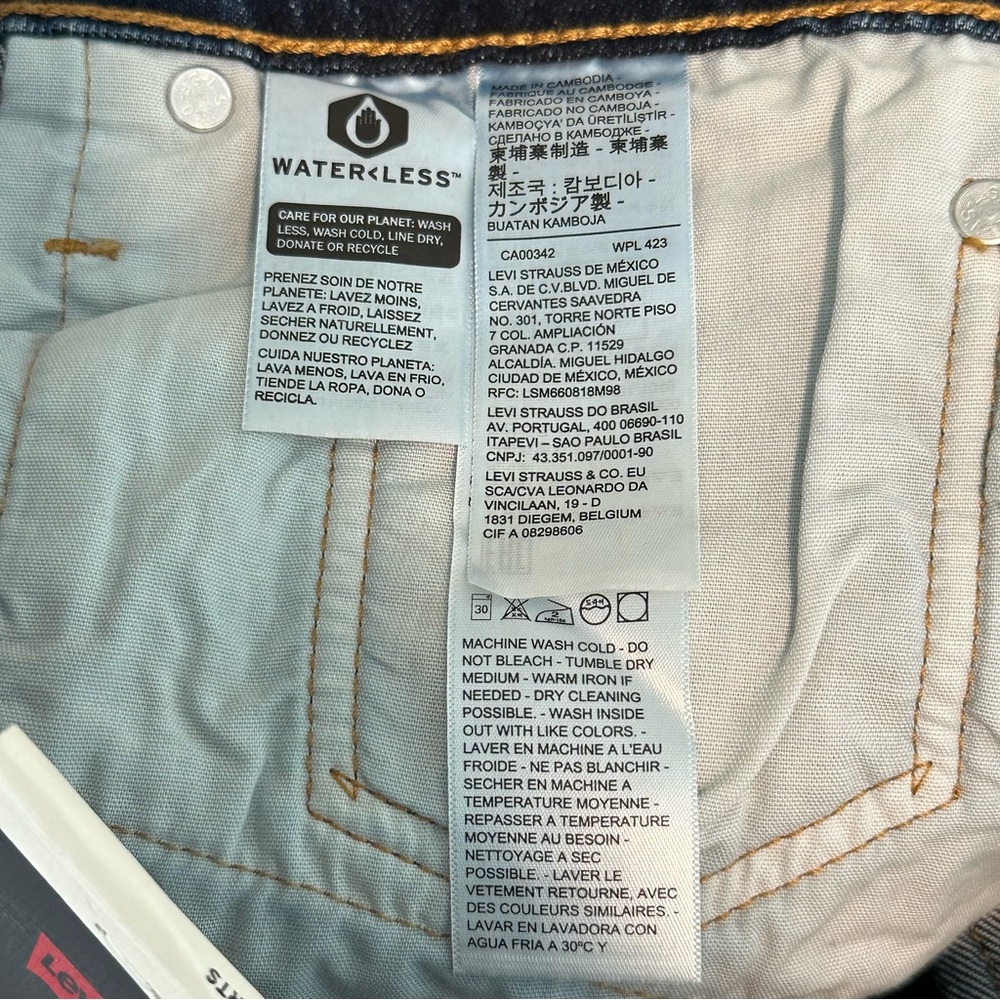 Levi’s 501 Mid Thigh Shorts in Salsa Center Dark Wash Size 33 - Picture 9 of 10